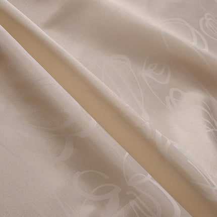 Jasnobeżowa zasłona prysznicowa na przelotkach