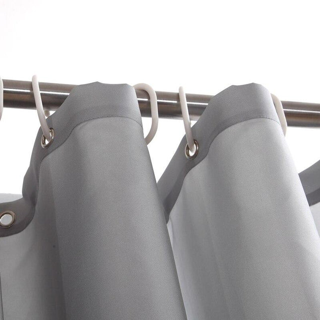 Szara materiałowa zasłona pod prysznic