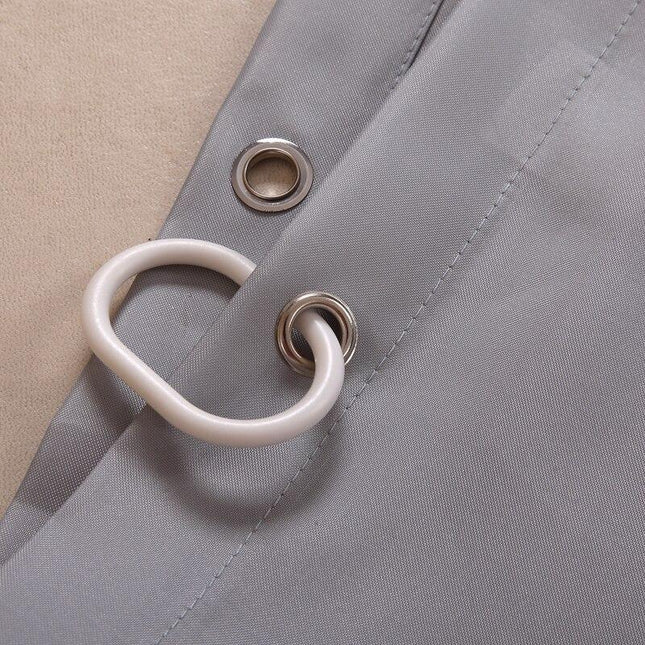 Szara materiałowa zasłona pod prysznic